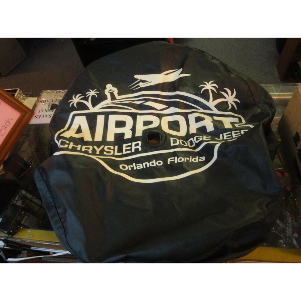 Airport Crysler Dodge orlando FL advertisment Boomerang jeep spare tire‎ cover